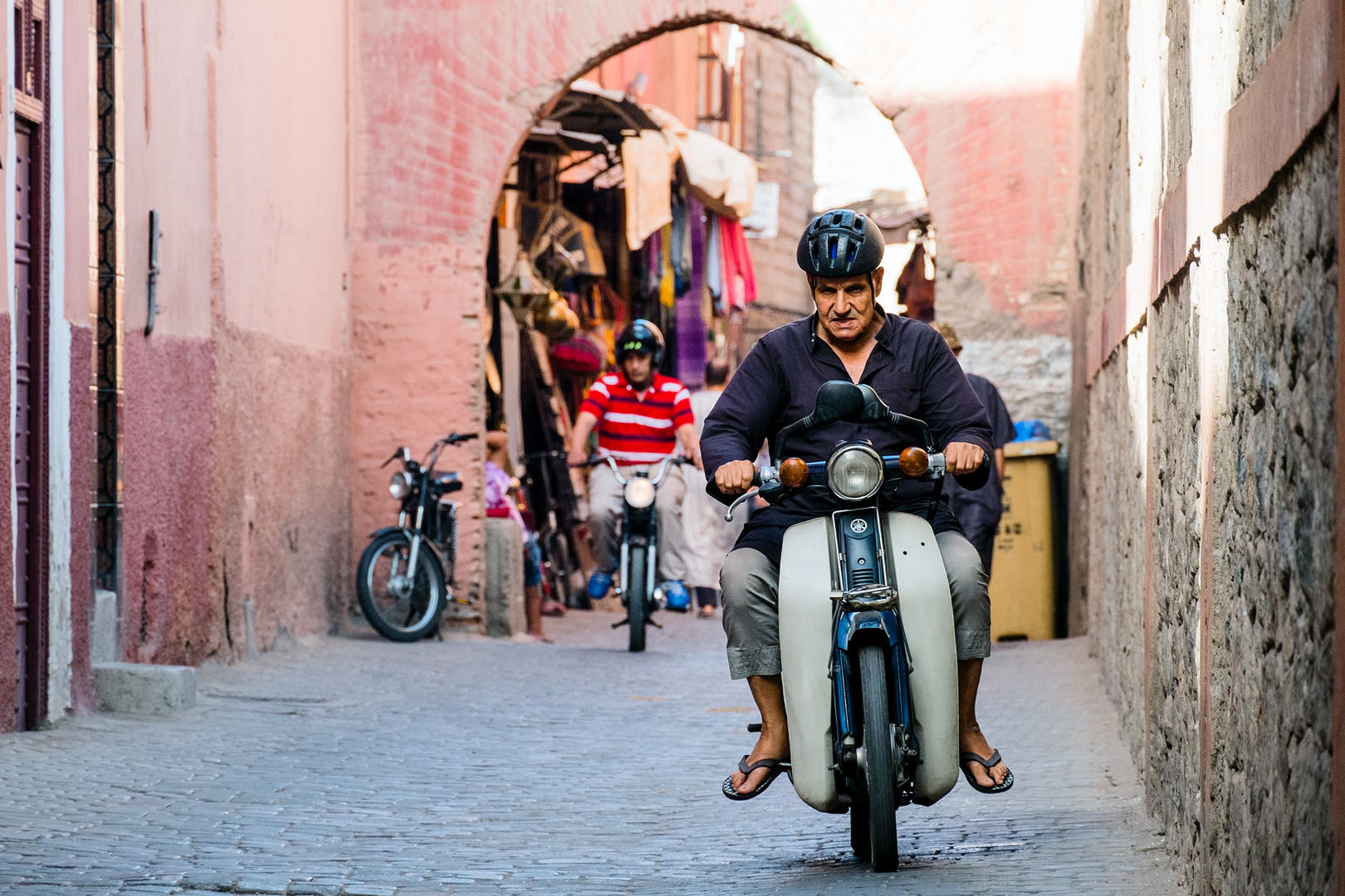 Scooter racing around Marrakech side streets