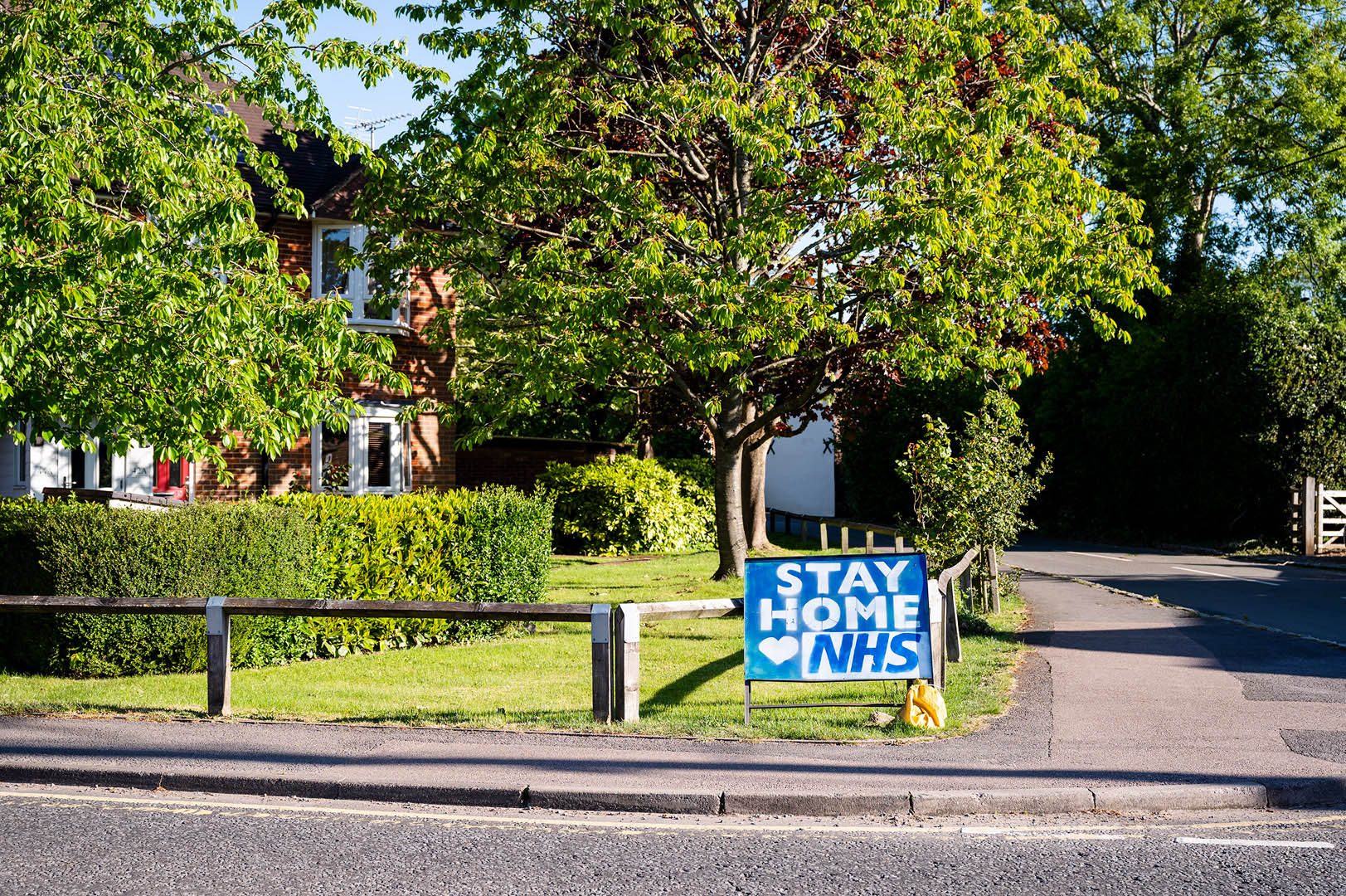 Stay at home for NHS sign on street corner