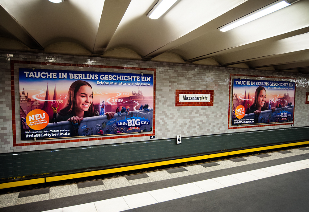 Advertising billboards on the walls where paintings were at Alexandraplatz metro station in 1987