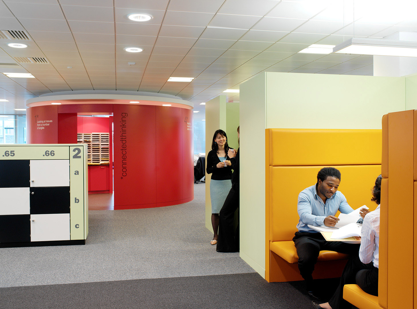 Interior with meeting pods in colourful office