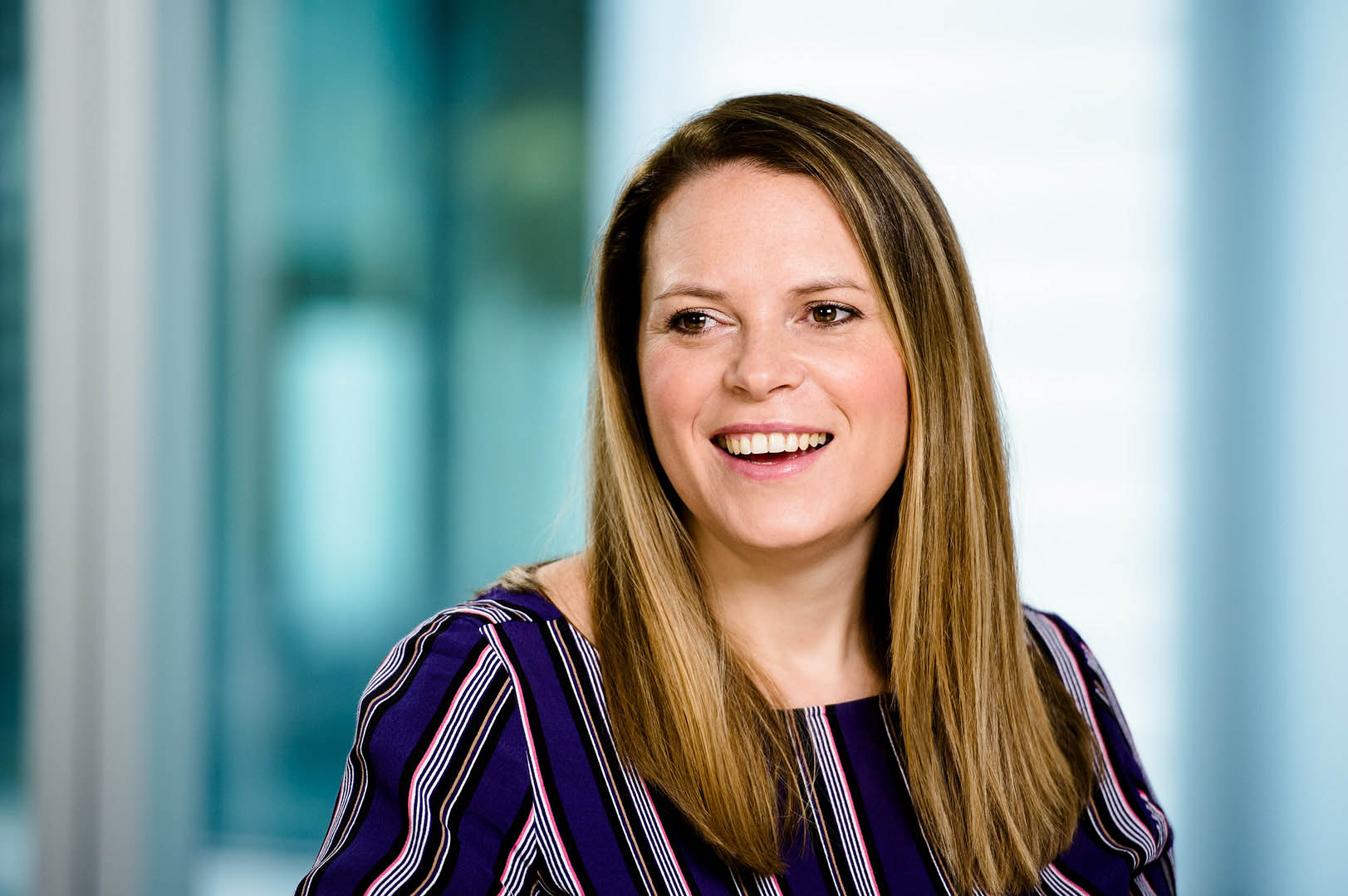 Reportage style shot of female director in conversation