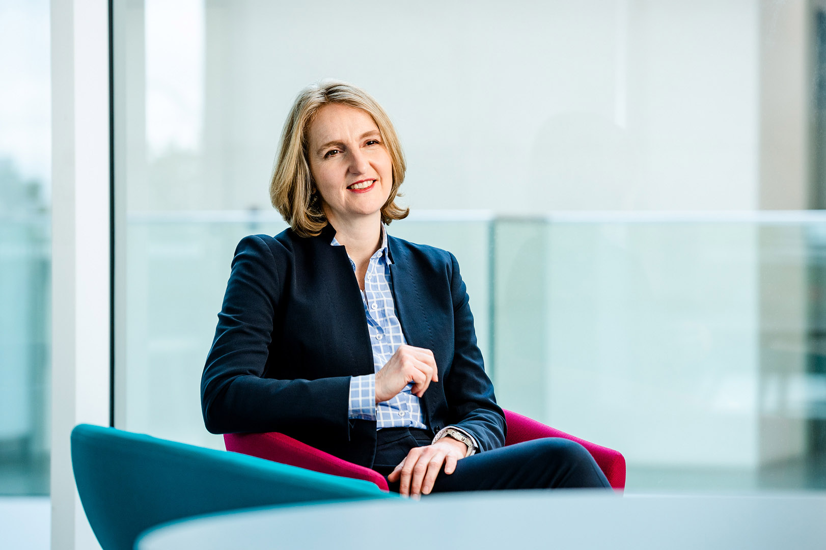 Female director relaxed in conversation off camera