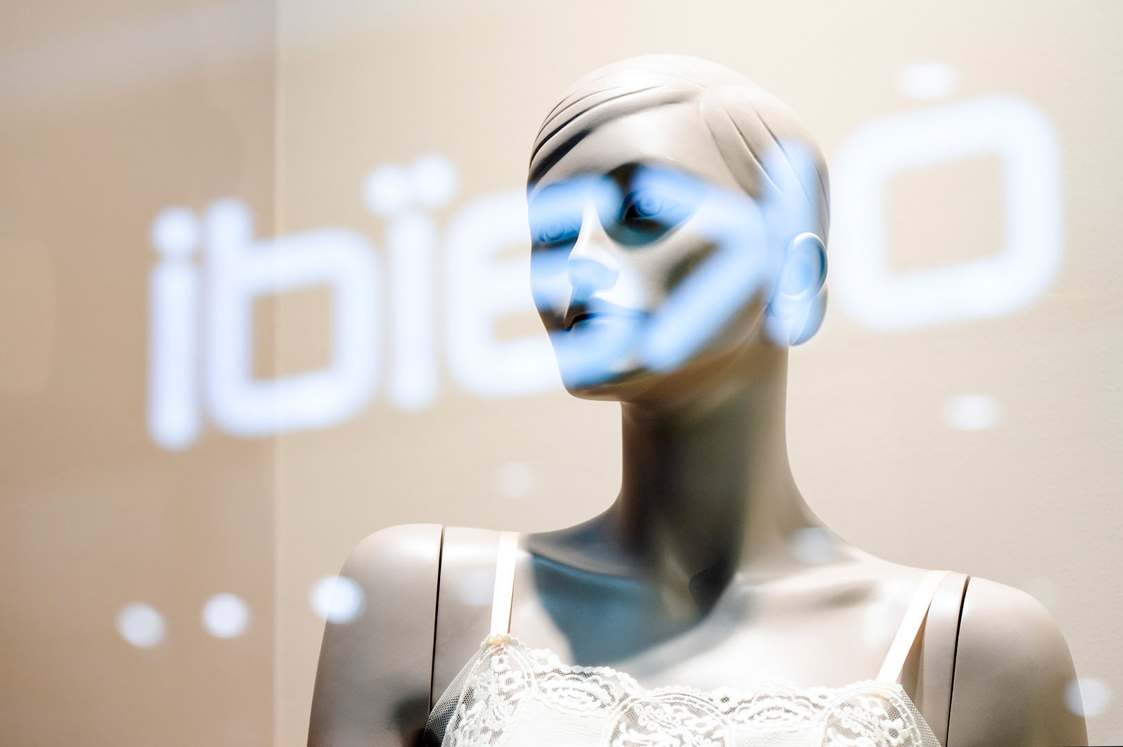 Sleepware mannequin looks through logo
