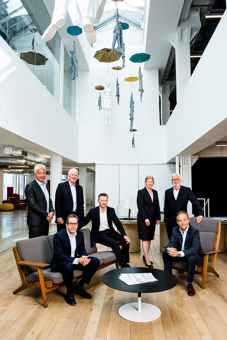 Group shot of Board of Property Company in architecturally relevant environment