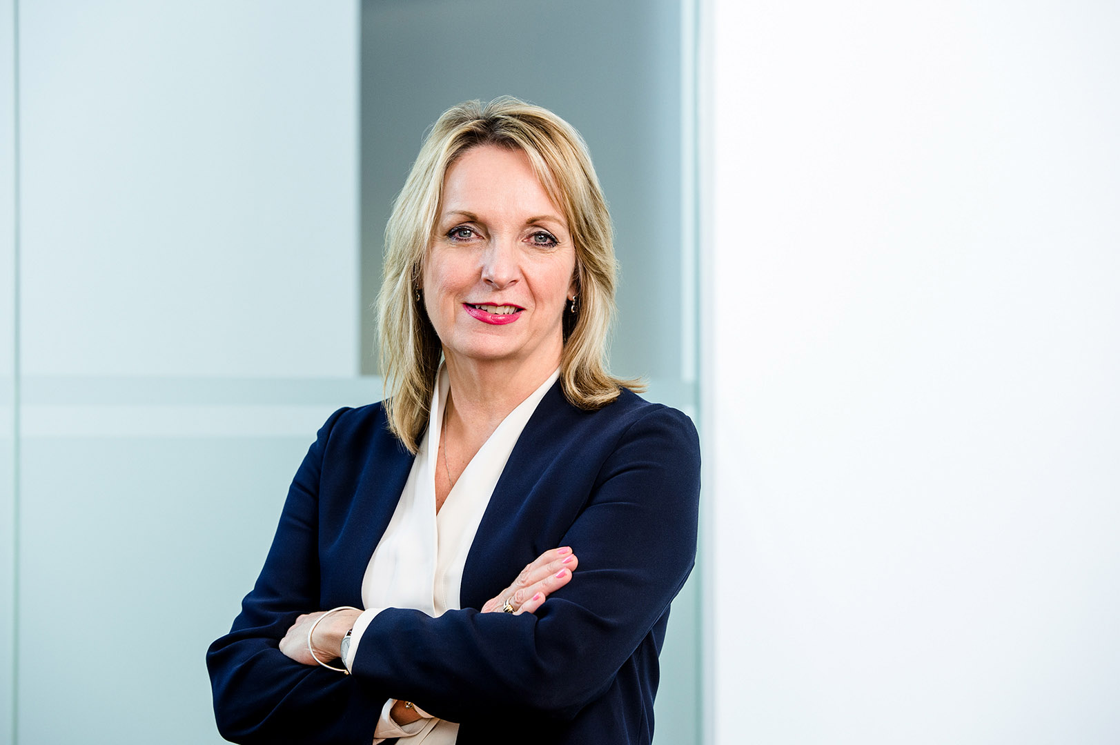 Corporate portrait of businesswoman looking to camera