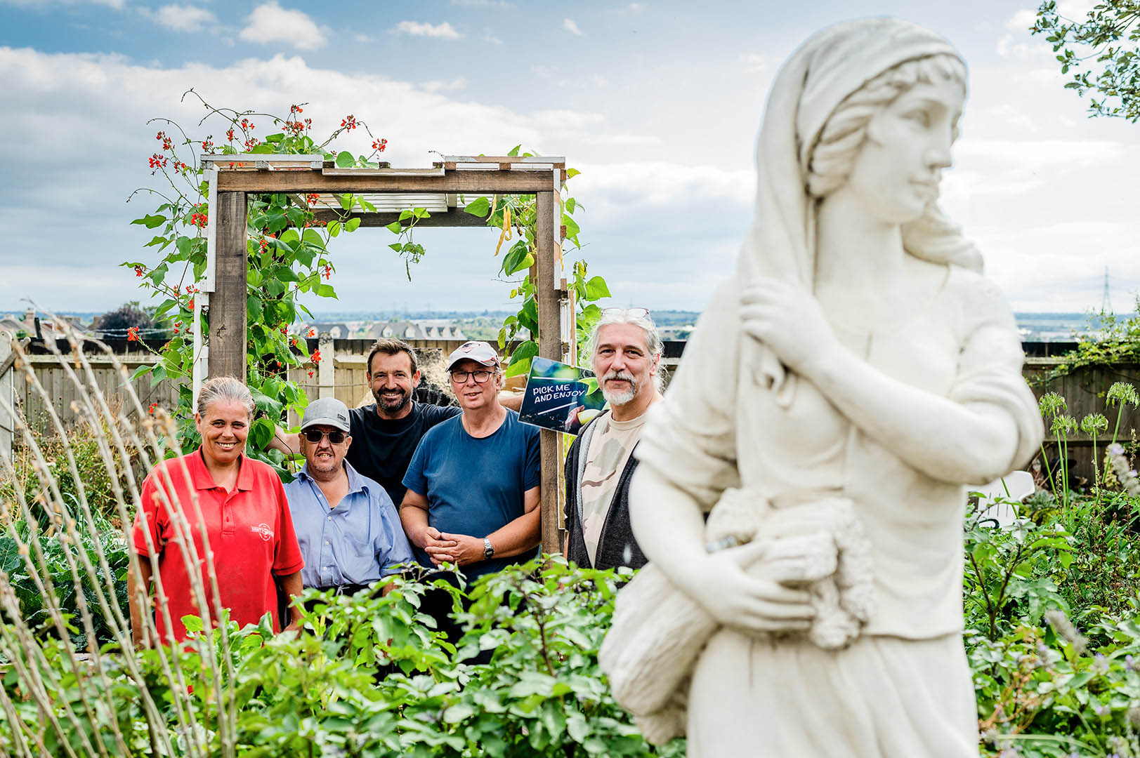 Group portrait of community volunteers in Secret Garden