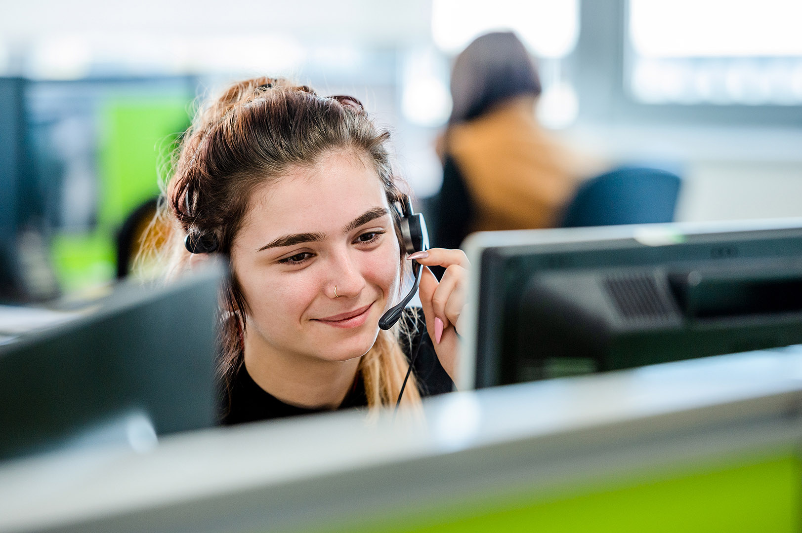 Woman on headset in Call Centre 
