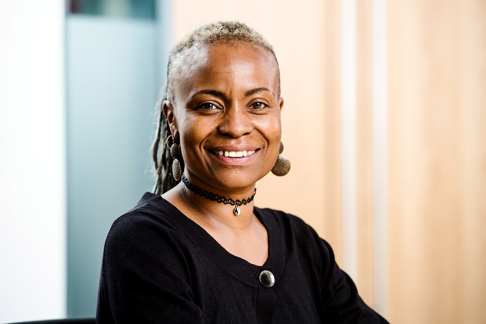 Reportage style portrait of black female charity director