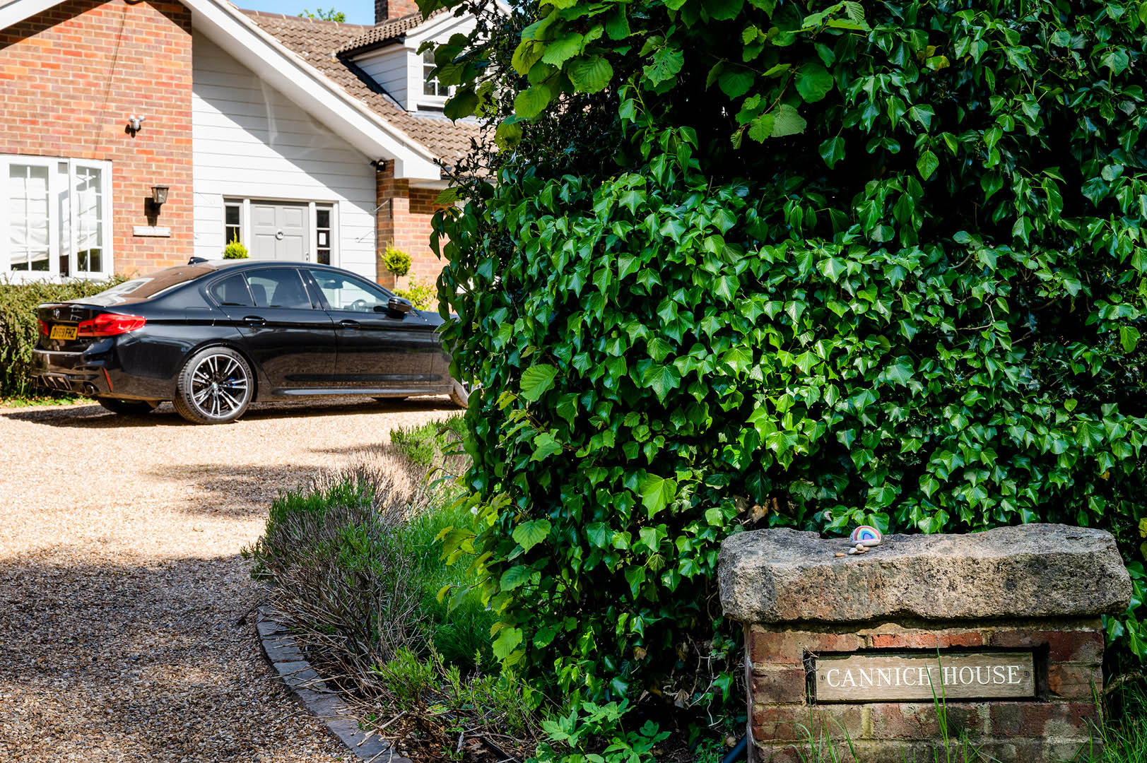 Rainbow pinted pebble in subtke show of support for the NHS during lockdown