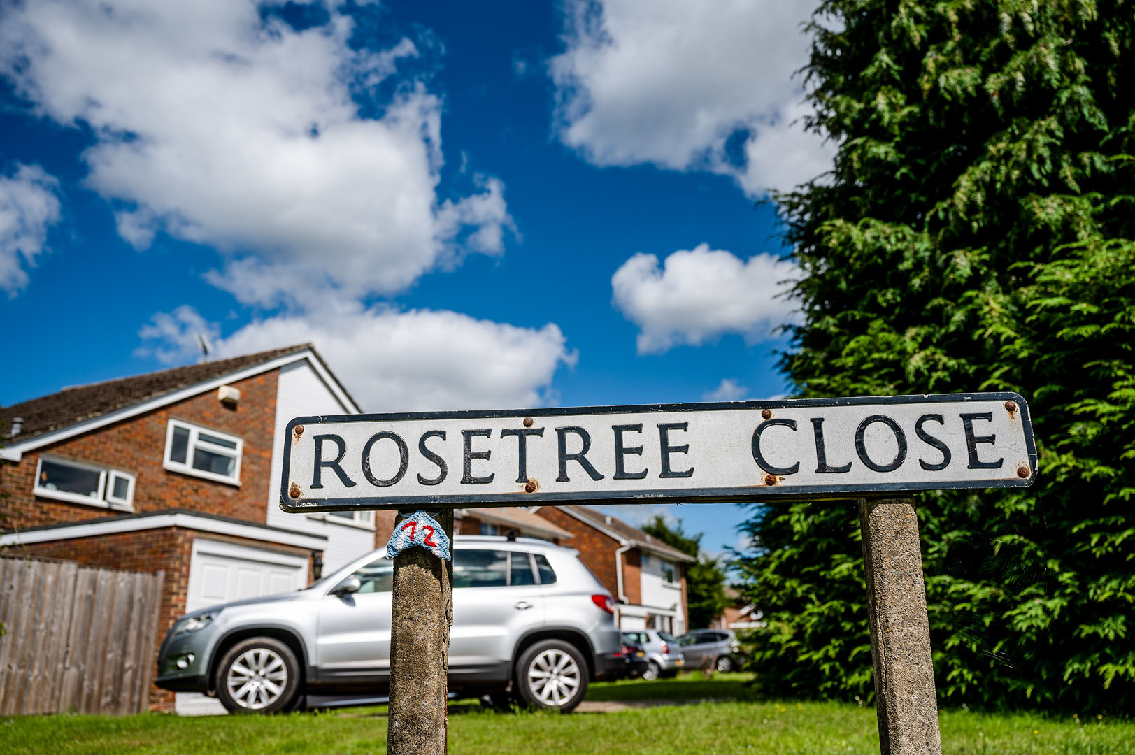 Rainbow scarf on roadsign during lockdown
